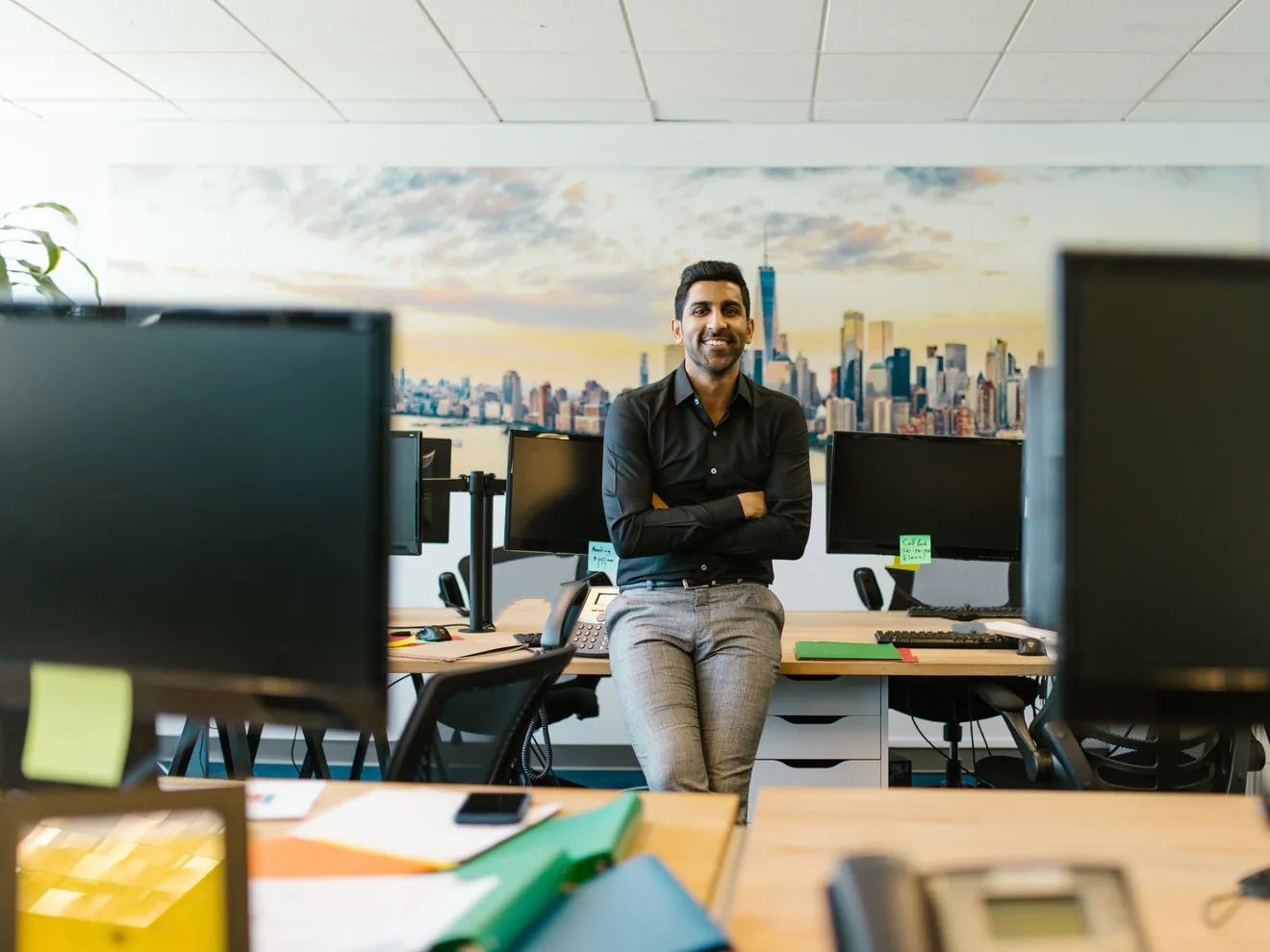 A business professional considering information in an office