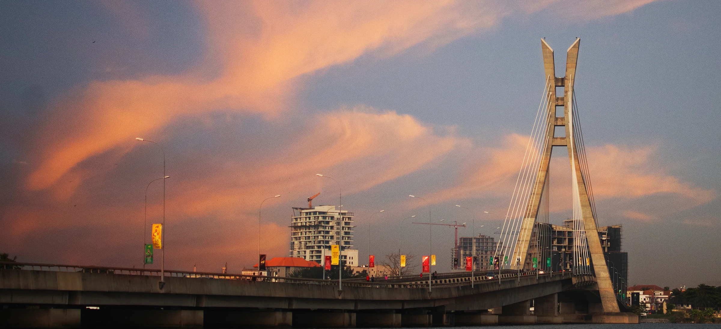 The Lekki-Ikoyi Link Bridge spanning the Lagos waterfront at sunset